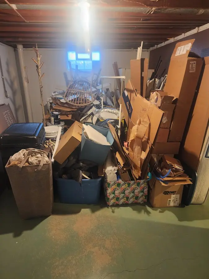 Roll-off dumpster container at job site for Yard Waste Dumpster Rental in Kingston